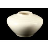 KEITH MURRAY FOR WEDGWOOD, a moonstone vase, circa 1960, of squat form, signed under (27cm