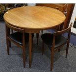 A 1960'S TEAK EXTENDING DINING TABLE AND FOUR CHAIRS, designed by Hans Olsen for Frem Rhole (110cm