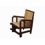 A 1920'S SECESSIONIST JOSEF HOFFMAN SCHOOL FIRE SIDE CHAIR, in dark stained oak, with wicker seat