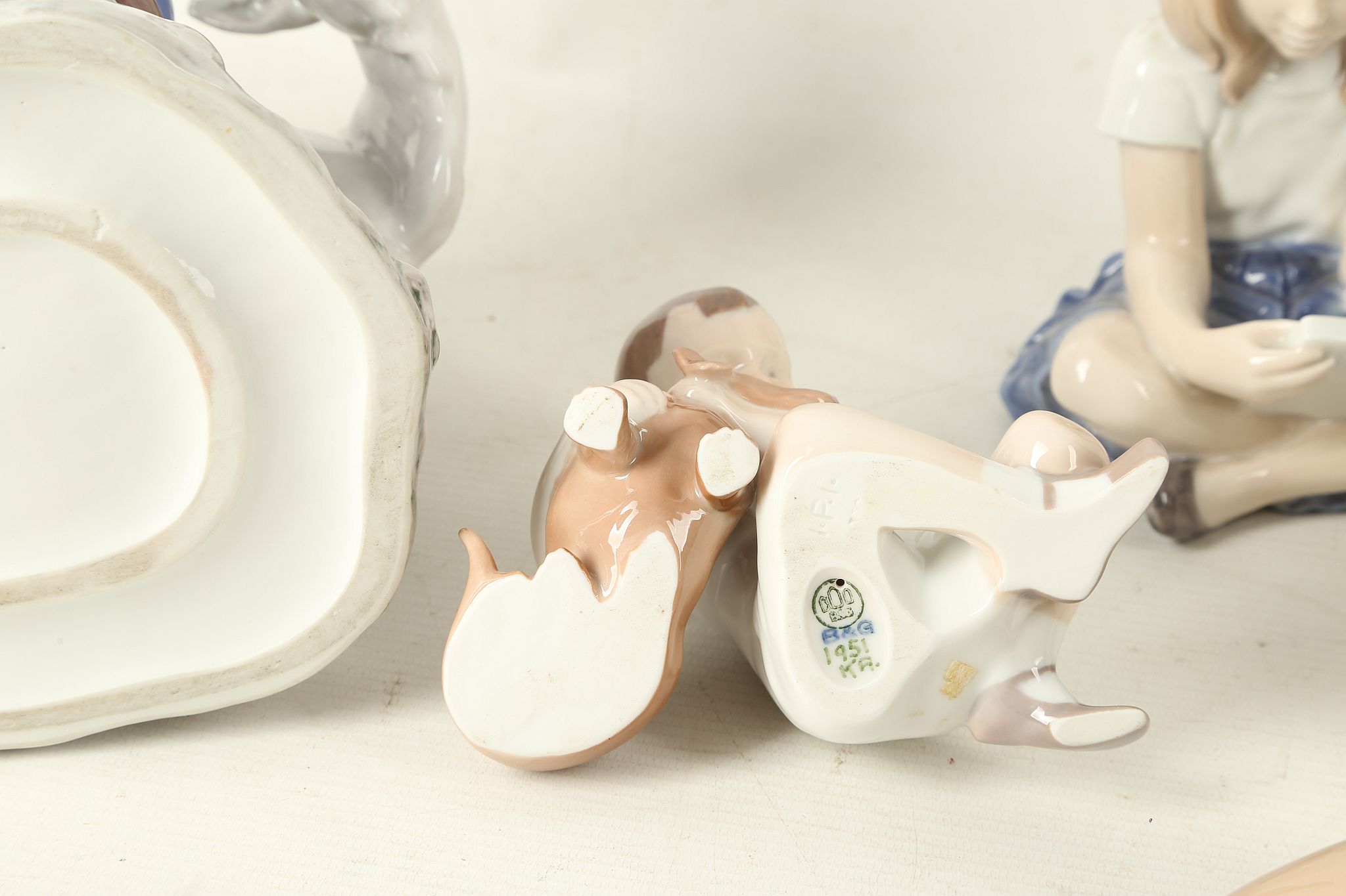 A ROYAL COPENHAGEN PORCELAIN FIGURAL GROUP, modelled in the form of a milk maiden milking a cow, - Image 3 of 3