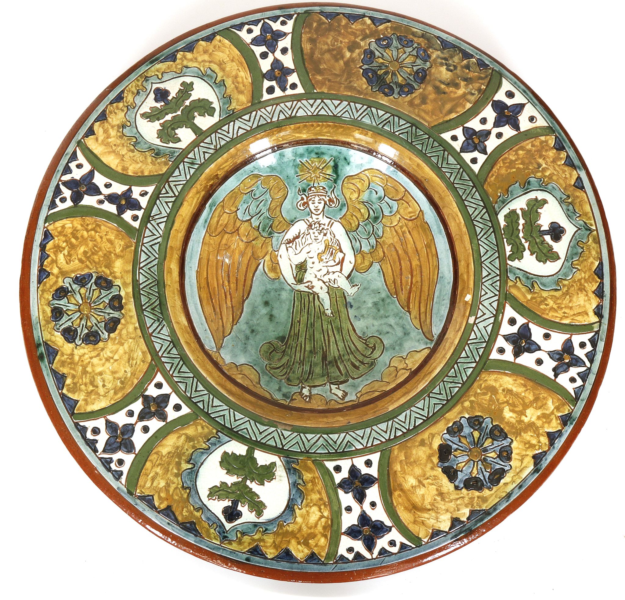 CARLO MANZONI, ITALY, a late 19th century pottery charger with incised slip border decoration,