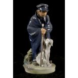 A ROYAL COPENHAGEN PORCELAIN GROUP, of a young good shepherd and his faithful dog, modelled and