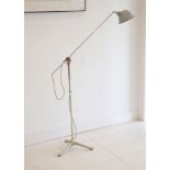 A 1950s CONTINENTAL INDUSTRIAL FLOOR LAMP, with grey enamelled shade, chrome adjustable stem and