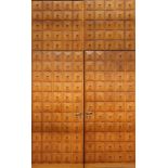 A PAIR OF ITALIAN 1950'S WALNUT PANELLED DOORS, designed by Osvaldo Borsani, with extra panel