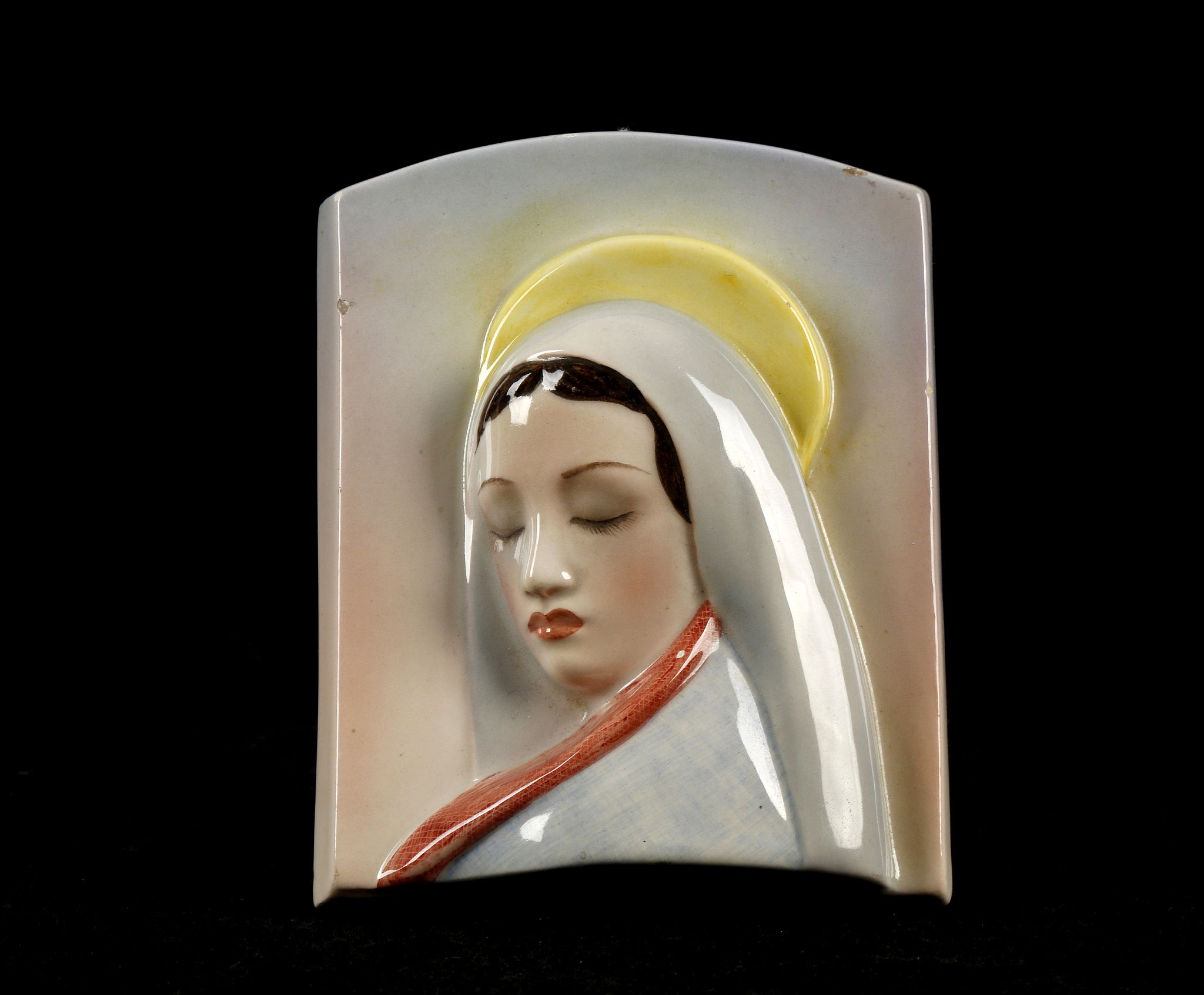 AN ITALIAN LENCI MANNER CERAMIC PLAQUE, modelled as a Madonna, painted in pastely colours, inscribed