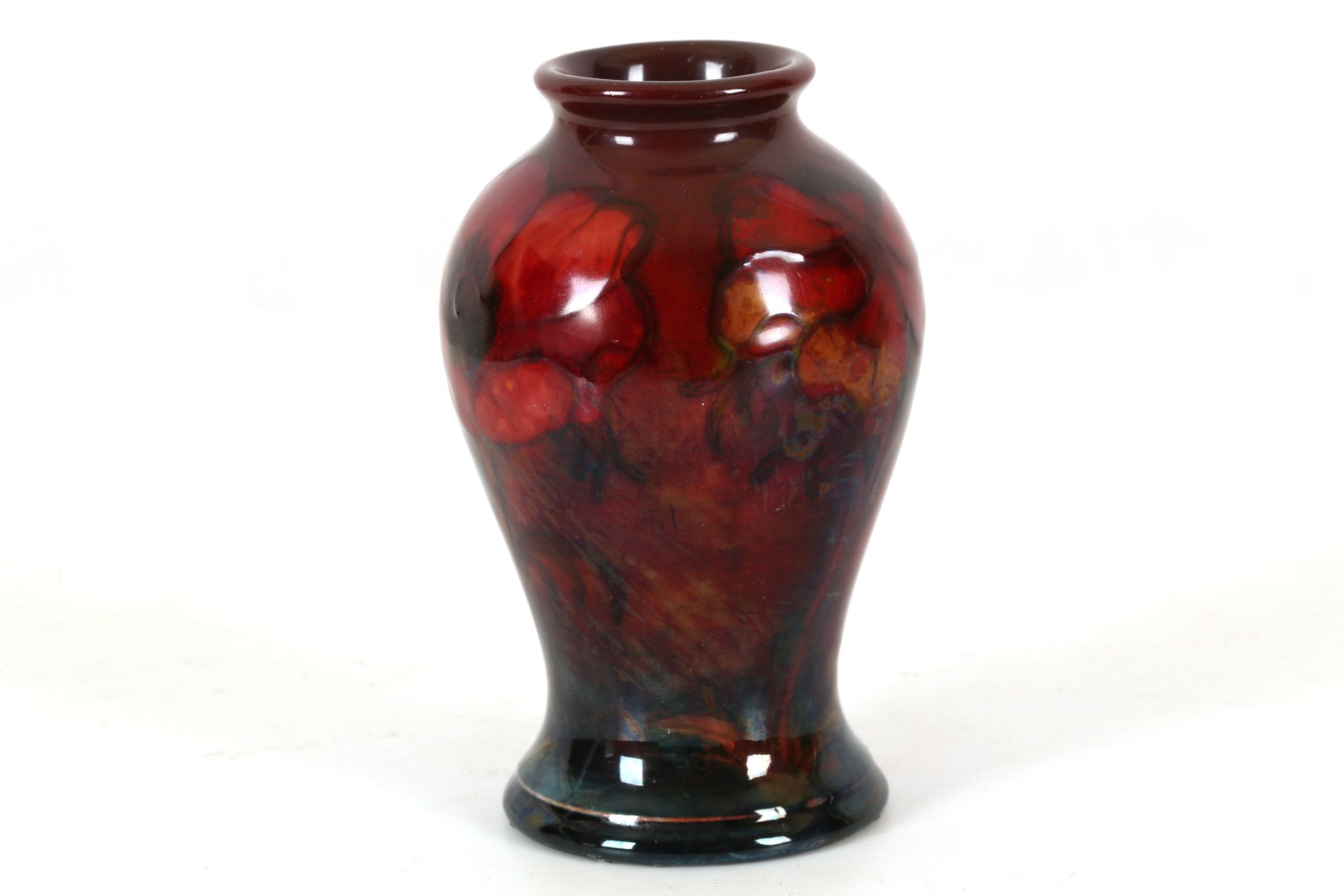 WILLIAM MOORCROFT 'BIG POPPY' FLAMBE VASE, CIRCA 1928-1935, bears Potter to HM The Queen paper label