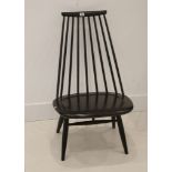 AN ILMARI TAPIOVARA EBONISED WOOD DINING CHAIR.