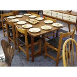 A 1970'S DANISH TEAK RECTANGULAR DINING TABLE AND SIX CHAIRS, with black leather sling seats (