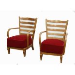 A PAIR OF FRENCH ART DECO ARMCHAIRS, CIRCA 1930, with beech frame and red velvet seat.