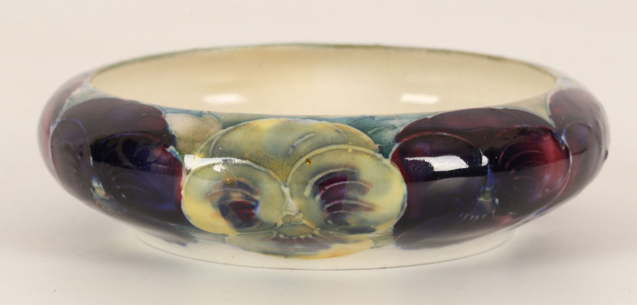 WILLIAM MOORCROFT 'PANSY' DISH, CIRCA 1920, with inverted rim, green painted signature under, ( - Image 2 of 3