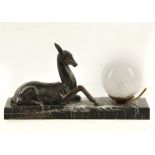 AN ART DECO LAMP, with bronzed model of a deer, on black and white marbled base (base 35cm x 9.
