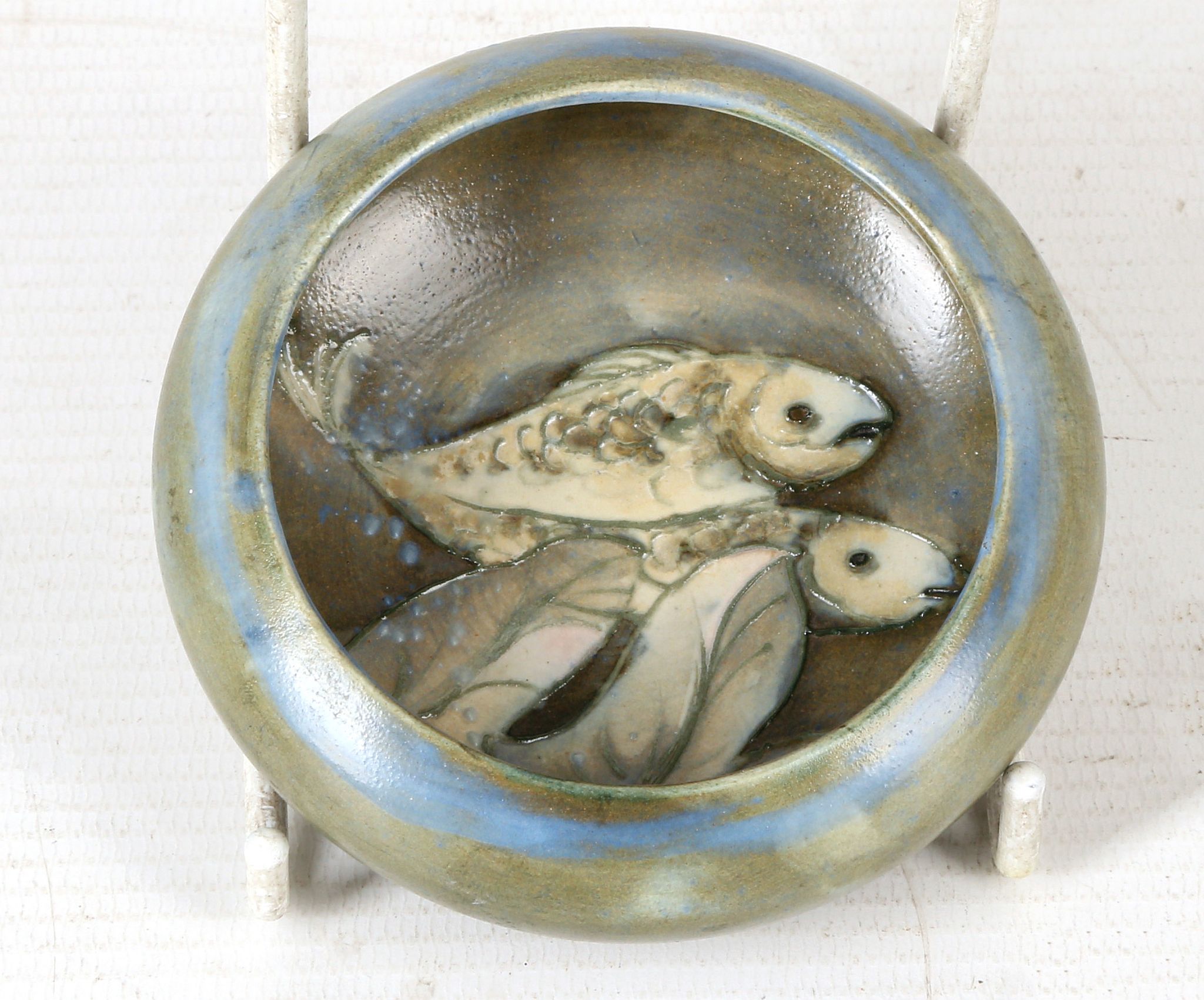 A WILLIAM MOORCROFT POTTERY MINIATURE BOWL, tube-lined with fish and leaves in beige and blue, c.