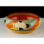 AN ART DECO CLARICE CLIFF FANTASQUE 'HAVRE' SHAPED BOWL, painted in colours between orange, yellow