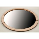 AN ART DECO 1930s MIRROR, of circular form, with rose coloured glass border (70cm diameter).