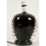 A MURANO ITALY, black glass lamp base, with clear glass applied loop decoration (30cm high).