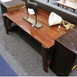 A 1970'S DANISH ROSEWOOD COFFEE TABLE, with plank top and splayed legs (134cm x 84cm max).