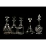 A collection of 5 decanters including 1 pair and a ship's example, 12 champagne flutes with 12