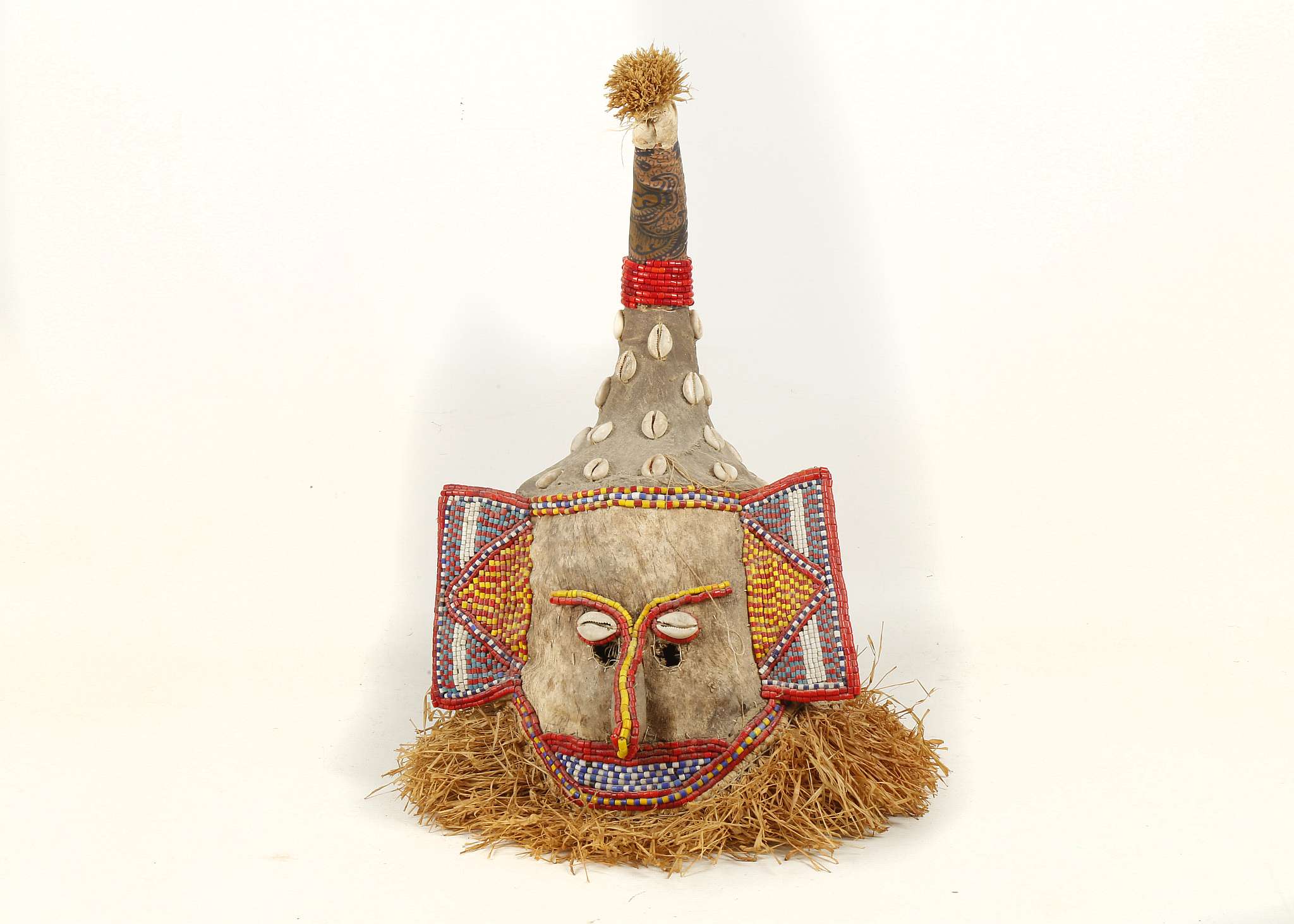 Kuba Mukieem helmet mask, Democratic Republic of Congo, hide, cowrie shells and beads, part of the