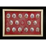 A framed sequence of 18th / 19th Century oval enamel plaques representing various European royal