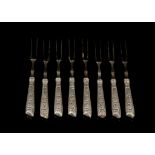 A set of 8 silver handled forks, acanthus decoration, steel forks, c.1800.