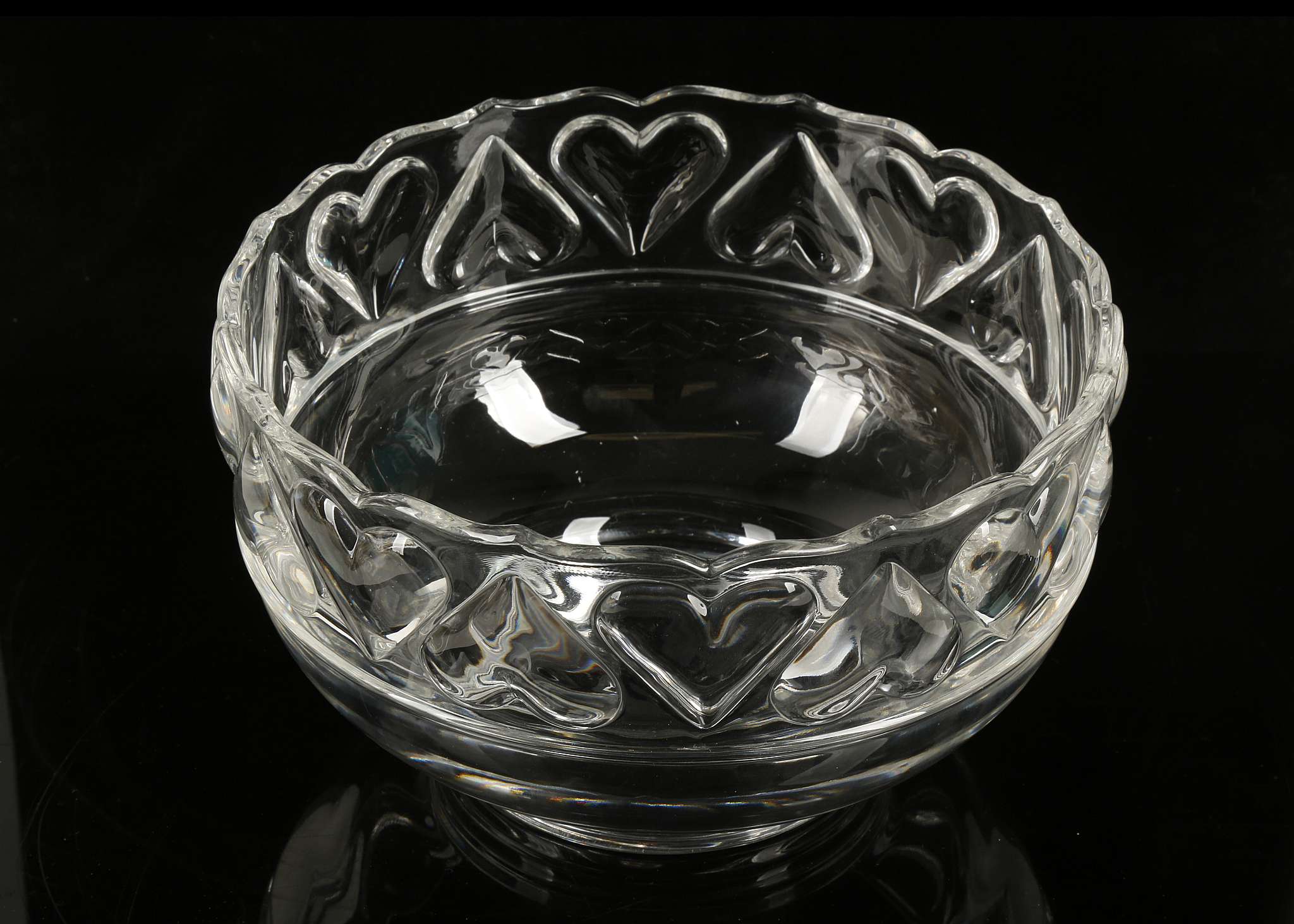 A boxed Tiffany & Co bowl with moulded hearts to rim, 20cm diameter x 12.5cm high.