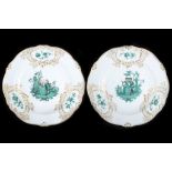 A FINE PAIR OF MEISSEN 'GREEN WATTEAU' PLATES, 19th century, moulded with the 'Marseille' pattern of
