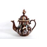A Victorian bargeware teapot, dated 1874, 39cm.