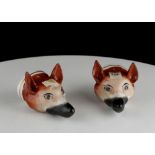 A PAIR OF STAFFORDSHIRE FOX HEAD STIRRUP CUPS, circa 1830, of typical form, naturalistically painted