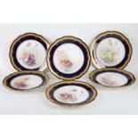 A set of six Limoges WM. Guerin and co dessert plates, each hand painted with floral sprays, three