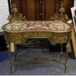Continental solid brass kidney shape table, 1st half 20th century, leaf border and all over floral