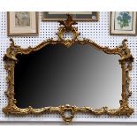 20th Century gilt decorated Rococo style mirror, acanthus finial, shaped 98cm x116cm