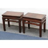 A pair of very early 20th Century Chinese Jichimu style hardwood stools, having carved foliage