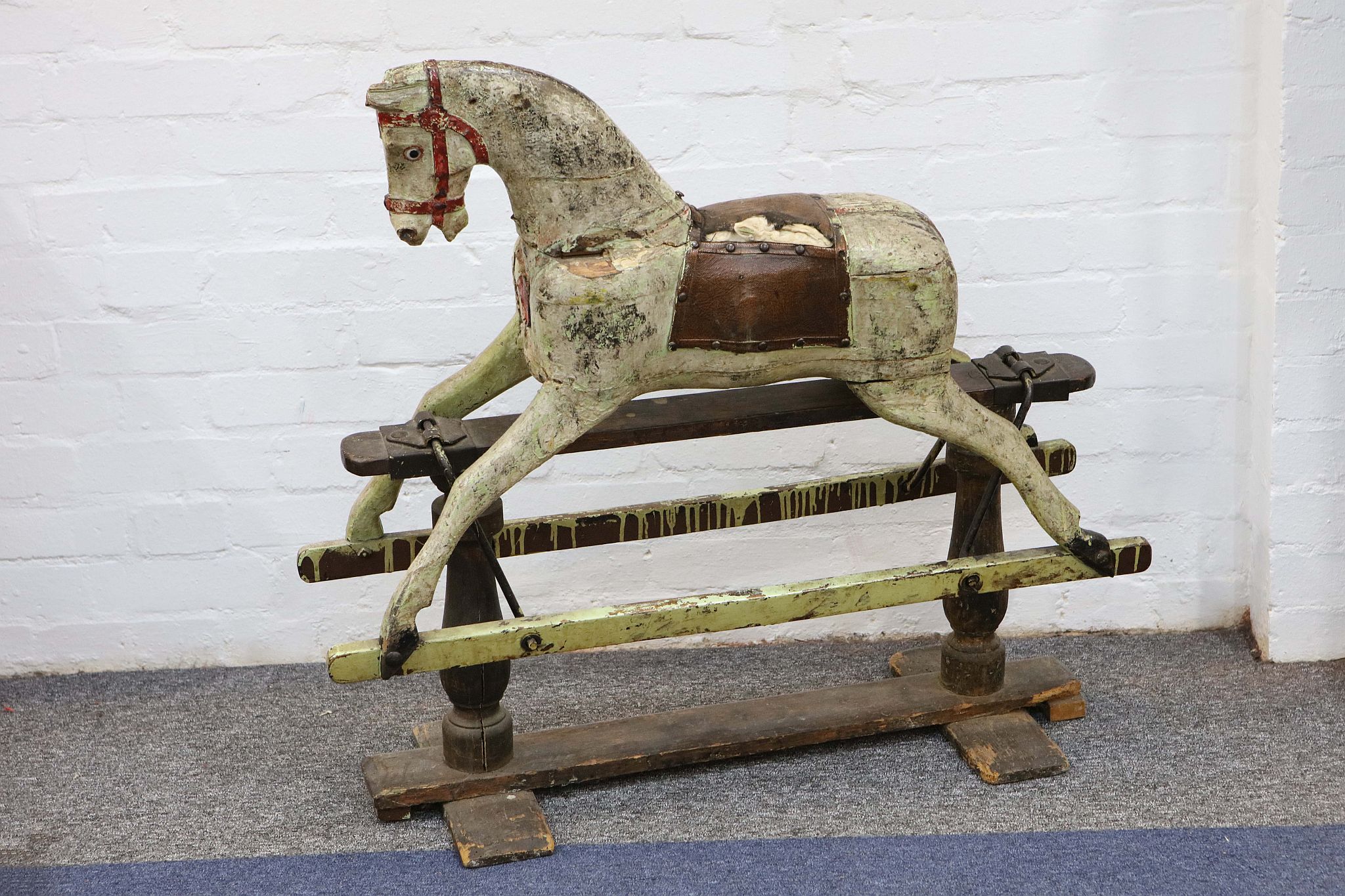 An early 20th Century painted rocking horse.