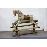 An early 20th Century painted rocking horse.
