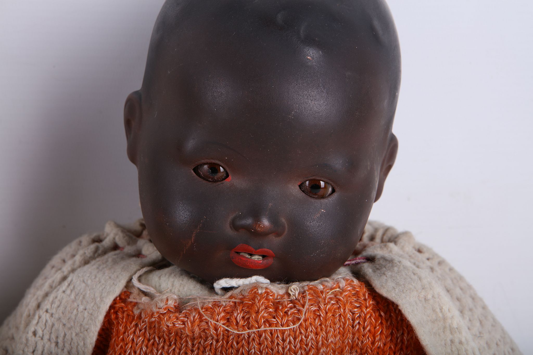 An Armand Marseilles black childs' doll, 50cm high, together with a composition head and baby girl - Image 3 of 3