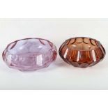 TWO MOSER 1930'S GLASS BOWLS, ut with faceted outer edge, one in amethyst colour, and the other in