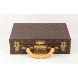 LOUIS VUITTON JEWELLERY CASE, date code for 2003, hardside monogram canvas and leather trim, lift
