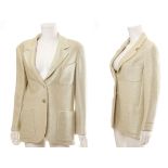 CHANEL COTTON AND RAYON GOLD JACKET, dated 2000, silver tone buttons, silk lined with weighted chain