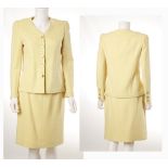 CHANEL CANARY YELLOW SKIRT SUIT, dated 1998, collarless box jacket and knee length skirt, size 38 (