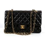 CHANEL MEDIUM 2.55 DOUBLE FLAP BAG, date code for 2006-8, black calfskin with gilt metal hardware,