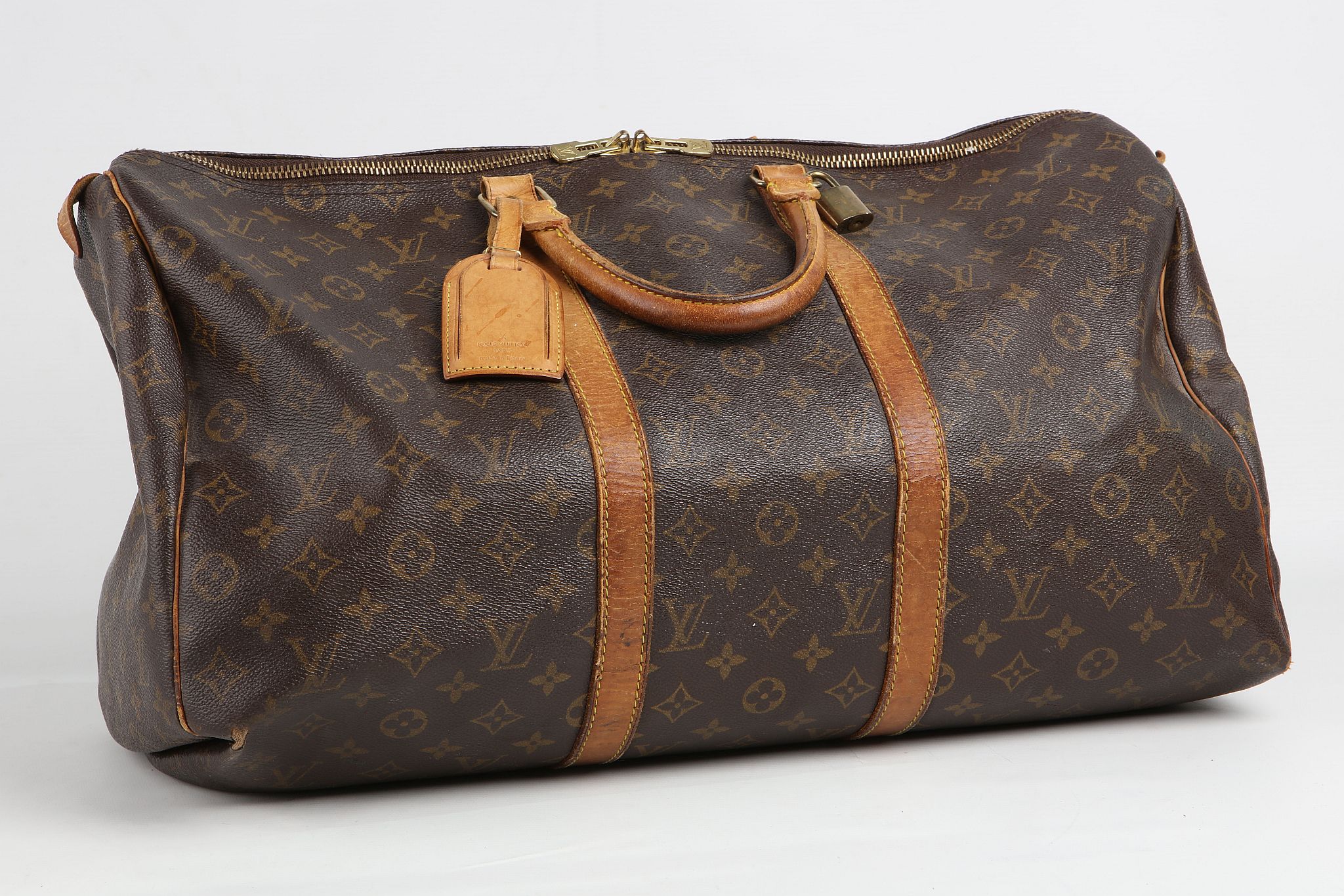 LOUIS VUITTON KEEPALL 50, date code for 1991, monogram canvas with leather trim, 50cm wide, 25cm