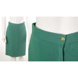 CHANEL EMERALD GREEN COTTON SKIRT, knee length with a single gilt button fastening, no size stated