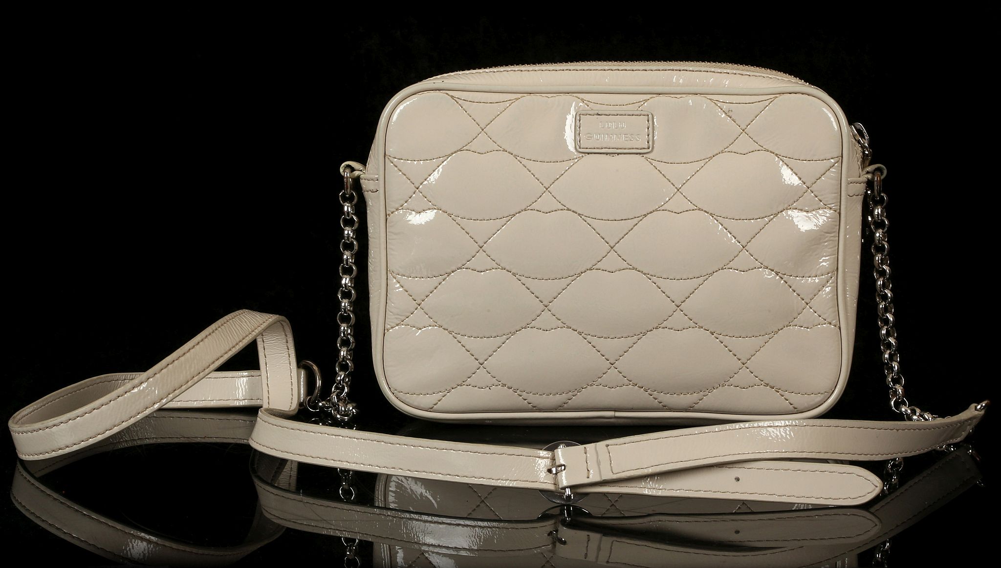 LULU GUINNESS LIPS HANDBAG, beige patent leather with stitched lips pattern, silver tone hardware,