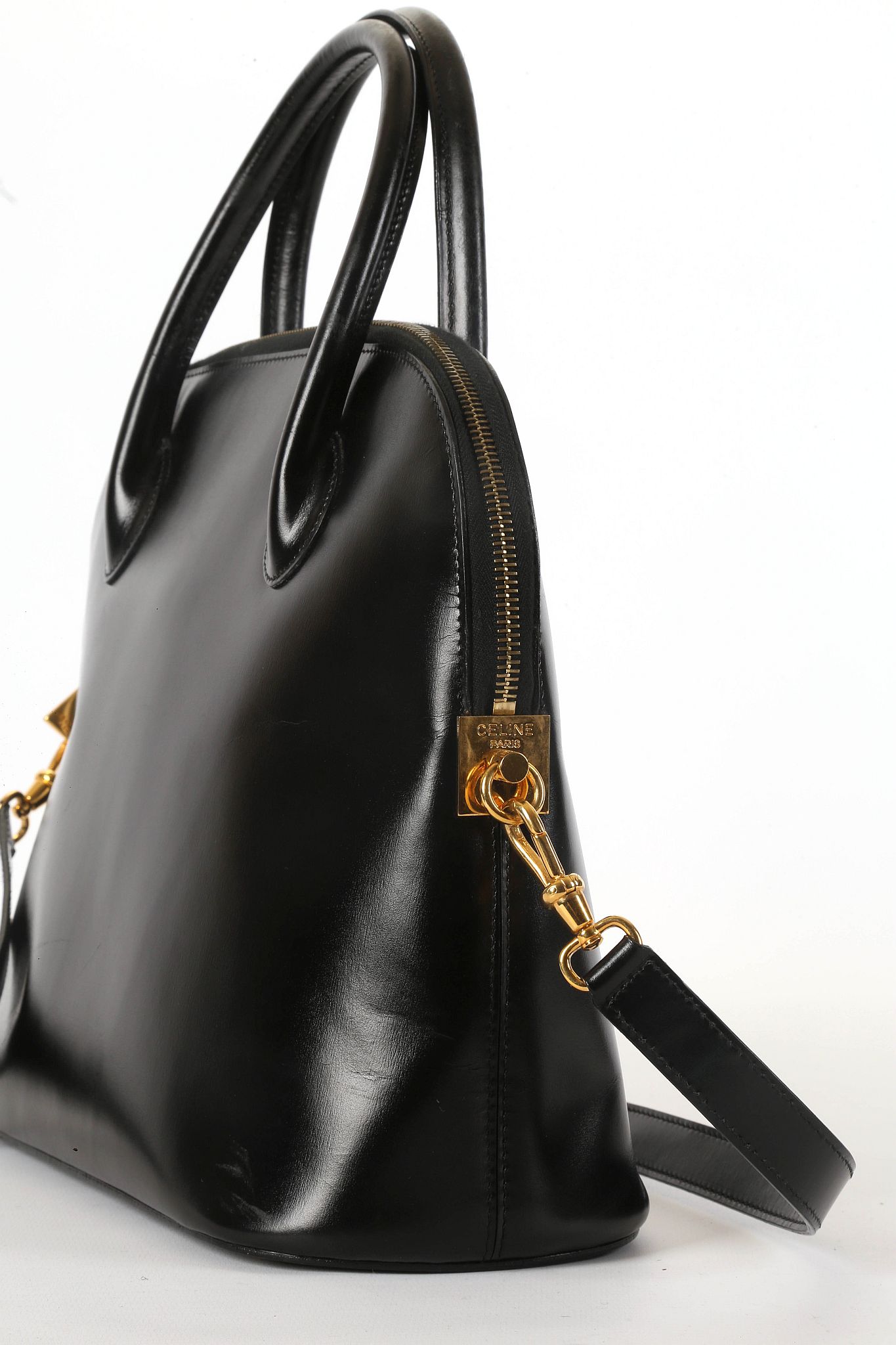 CELINE BLACK BOLIDE STYLE HANDBAG, 1990s, shiny black leather with gilt tone hardware, two rolled - Image 4 of 10