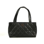 CHANEL VINTAGE EAST/WEST TOTE, early 1980s, quilted black caviar leather with gilt hard ware, 33cm