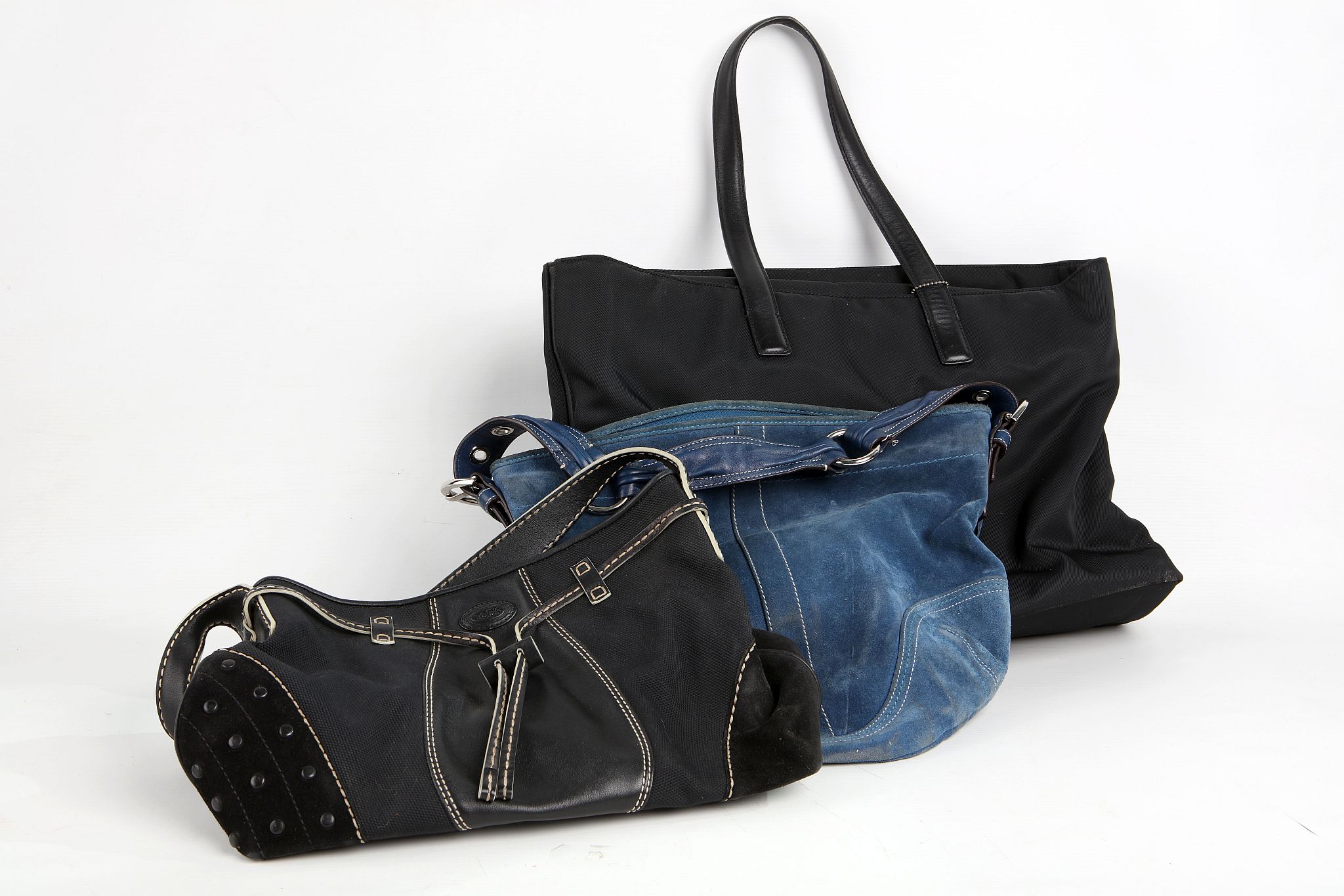 TWO COACH HANDBAGS, one a black office example, the other blue suede, together with a black Tod's