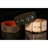 THREE LOUIS VUITTON STRAPS/CUFFS, one to celebrate the 2004 New York store opening, another the