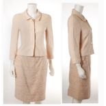 AN ASSEMBLED CHANEL PALE PINK WOOL SKIRT SUIT, both pieces dated 1999, the jacket with unusual