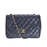CHANEL FLAP HANDBAG, date code for 1986-88, black quilted leather with rounded flap, gilt tone