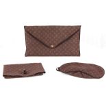LOUIS VUITTON TRAVEL KIT, comprising monogramme eye mask and neck pillow case in pouch (3) This